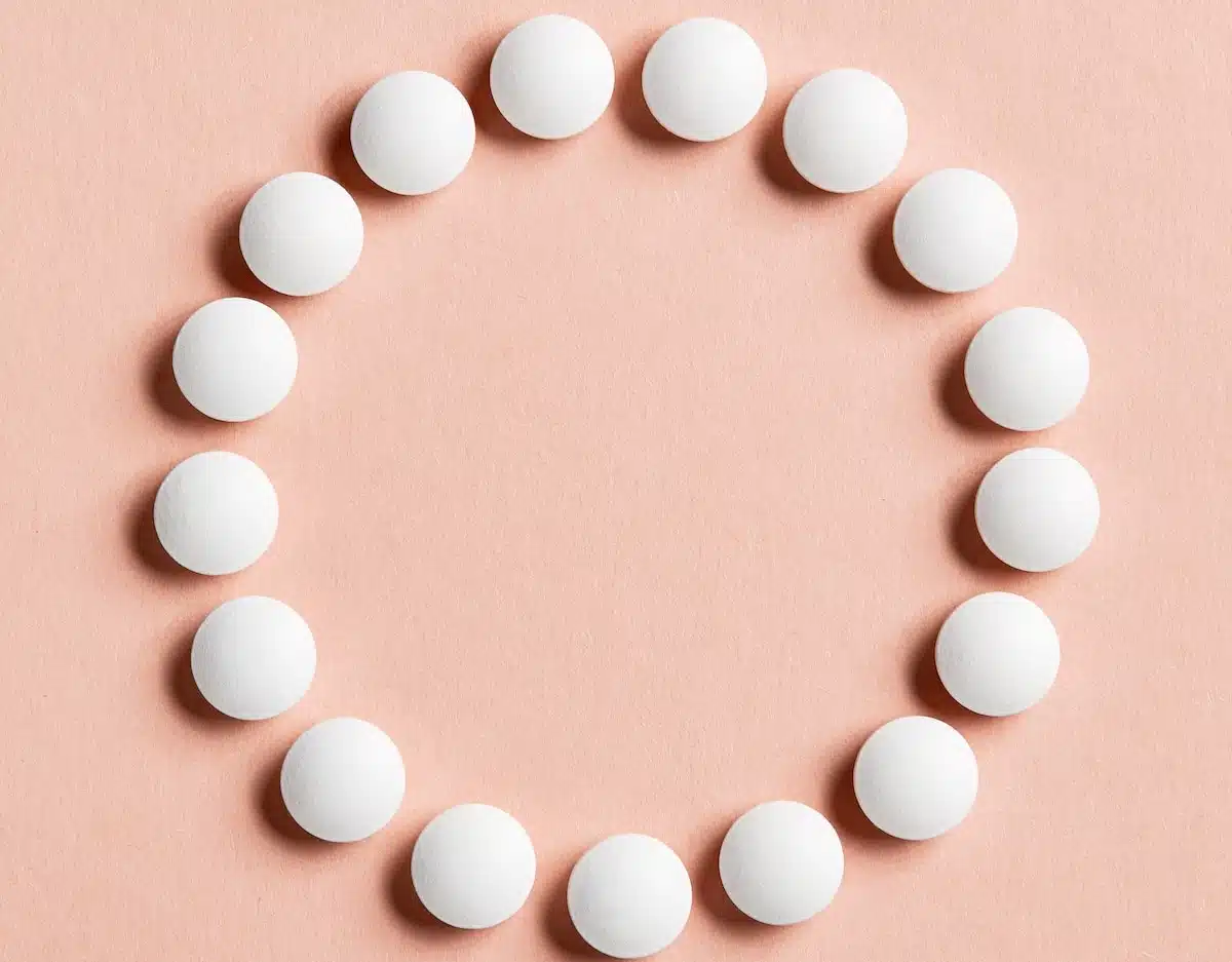 HRT Blog 68 circle of dhea tablets on a counter top