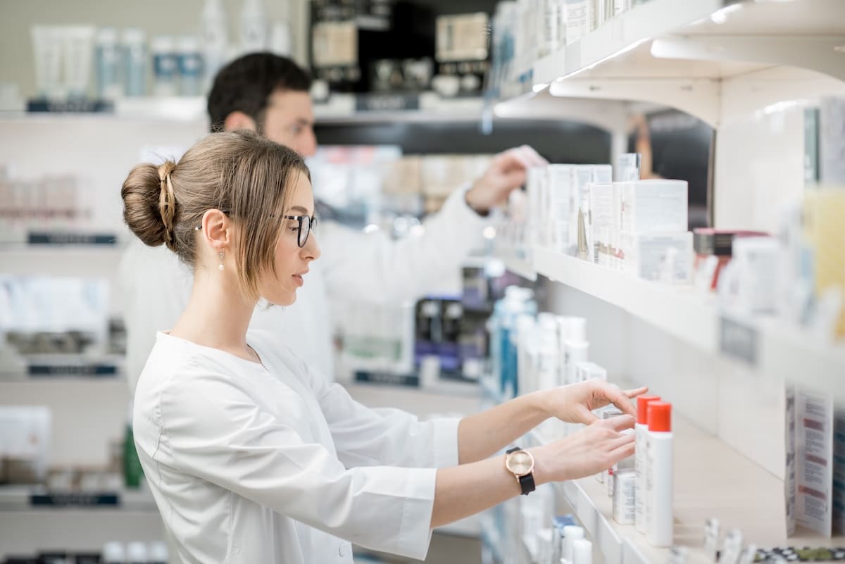 pharmacist fills a progesterone perscription.