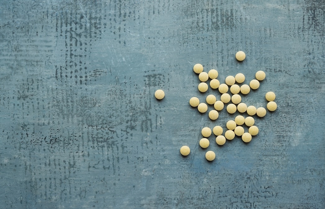 Pellets in hormone therapy shown arranged on a flat surface