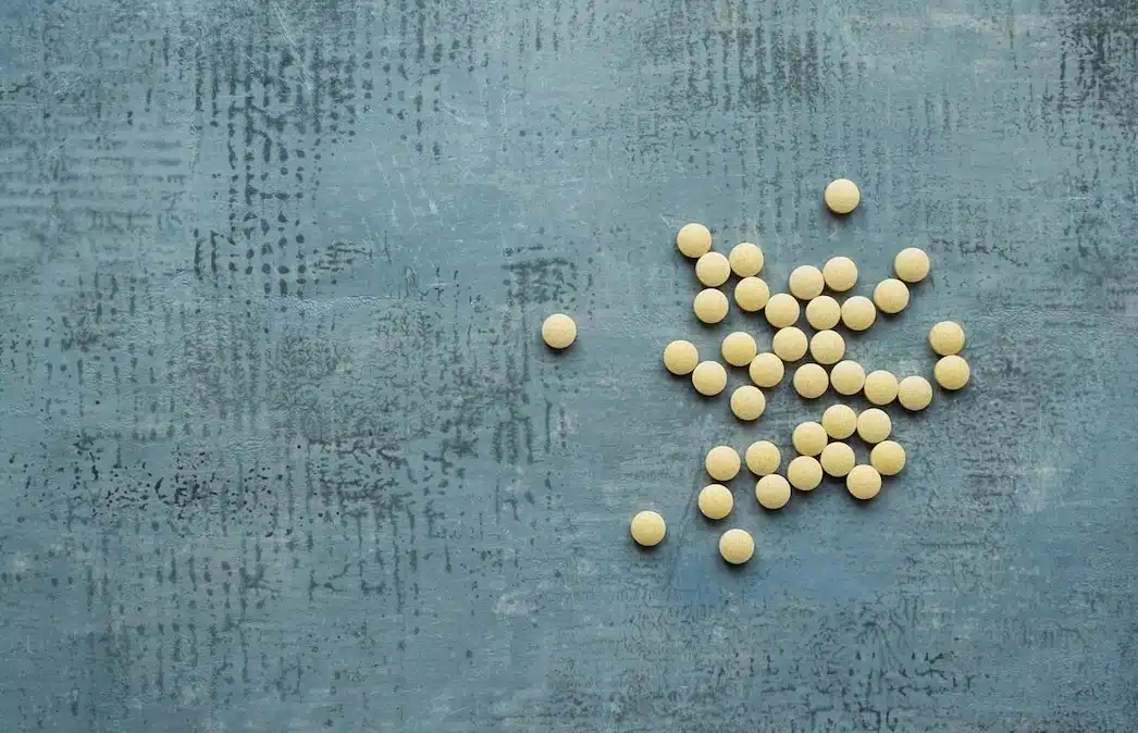 HRT Blog 26 Pellets in hormone therapy shown arranged on a flat surface